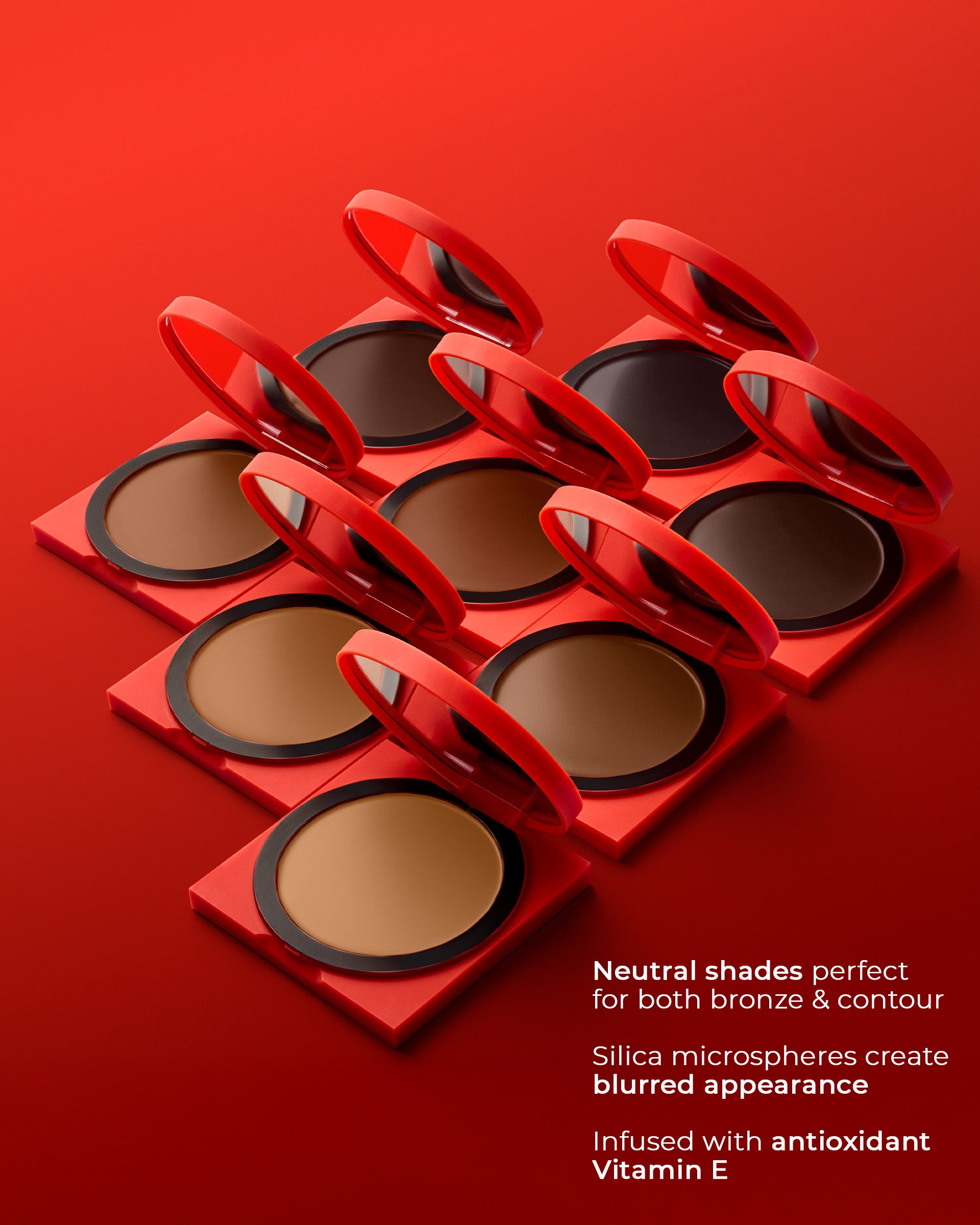 Set of Hung Vanngo Tansculpt compact powder cases with red casings on a red background