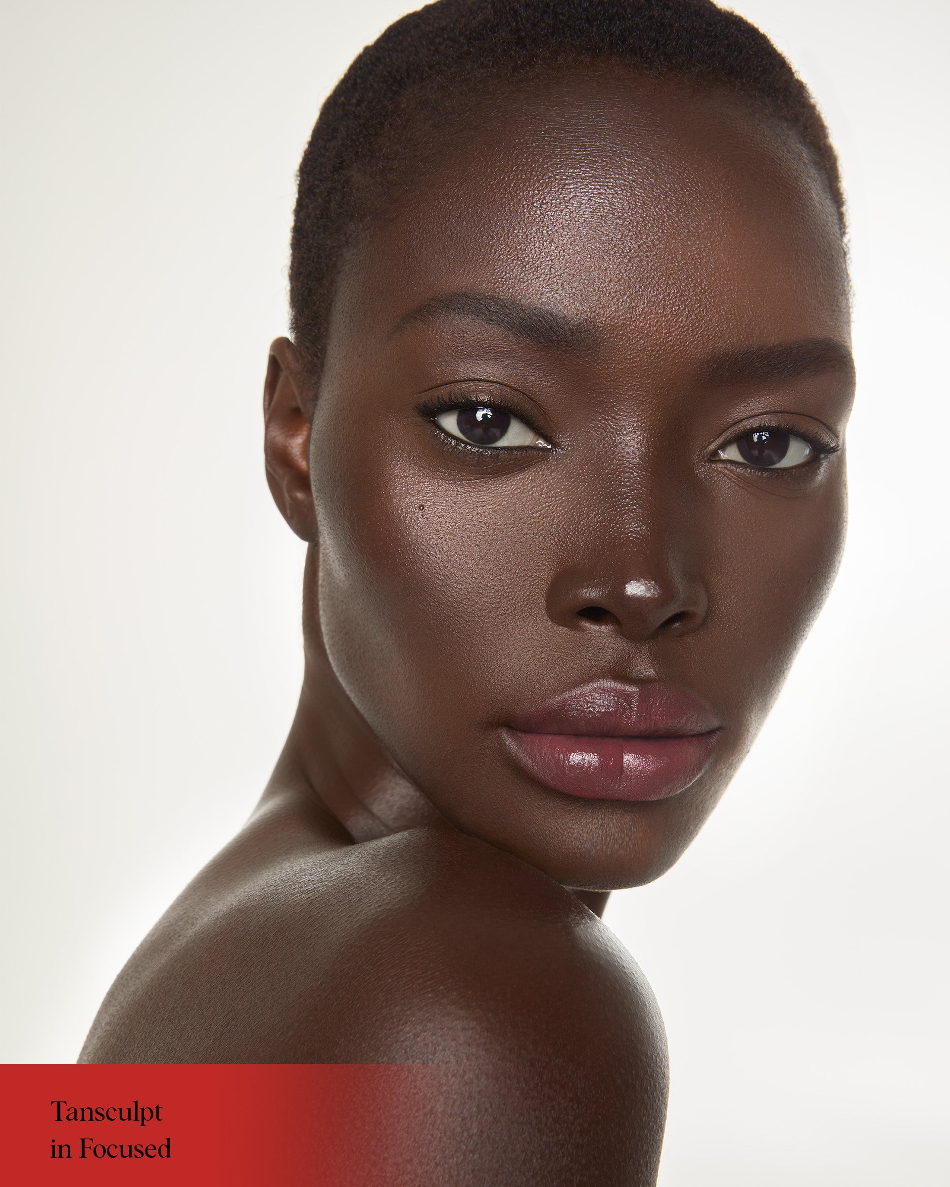 Close-up of a model wearing Hung Vanngo Tansculpt cream contour in Focused
